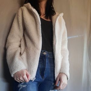 fluffy white zip up